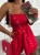 Kurzer roter Damen-Playsuit für den Sommer, trägerlos mit gerafftem Korsett-Oberteil und lockeren Shorts mit Taschen und Bindegürtel in der Taille