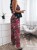 sommer-jumpsuit-mit-korsett-und-langer-hose-leo-blumenmuster.webp