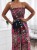 sommer-jumpsuit-mit-korsett-und-langer-hose-leo-blumenmuster.webp