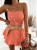 Sommer-Overall aus Muselin – apricotfarbener Skort-Jumpsuit mit Rüschen