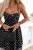 czarna elegancka sukienka mini na cienkich ramiączkach w białe grochy