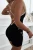 Schwarzer gerippter kurzer Jumpsuit mit Push-up-Effekt
