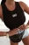 Schwarzes geripptes Racerback-Top mit „Icon“-Schriftzug