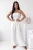 Weißer Musselin-Jumpsuit mit langer Hose