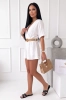 Weißer Musselin-Jumpsuit mit Ausschnitt und Gürtel