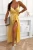Gelbes Maxi-Kleid mit Spaghetti-Trägern, Ausschnitt und Beinschlitz