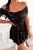 Schwarzer Carmen-Jumpsuit mit Hosenrock-Effekt