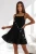 Schwarzes Musselin-Minikleid in A-Linie mit dünnen Trägern