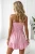 kombinezon-letni-krotki-sunny-jasny-roz-2.webpakrótki kombinezon letni bez ramiączek z gorsetową górą i spódnico-spodenkami różowy